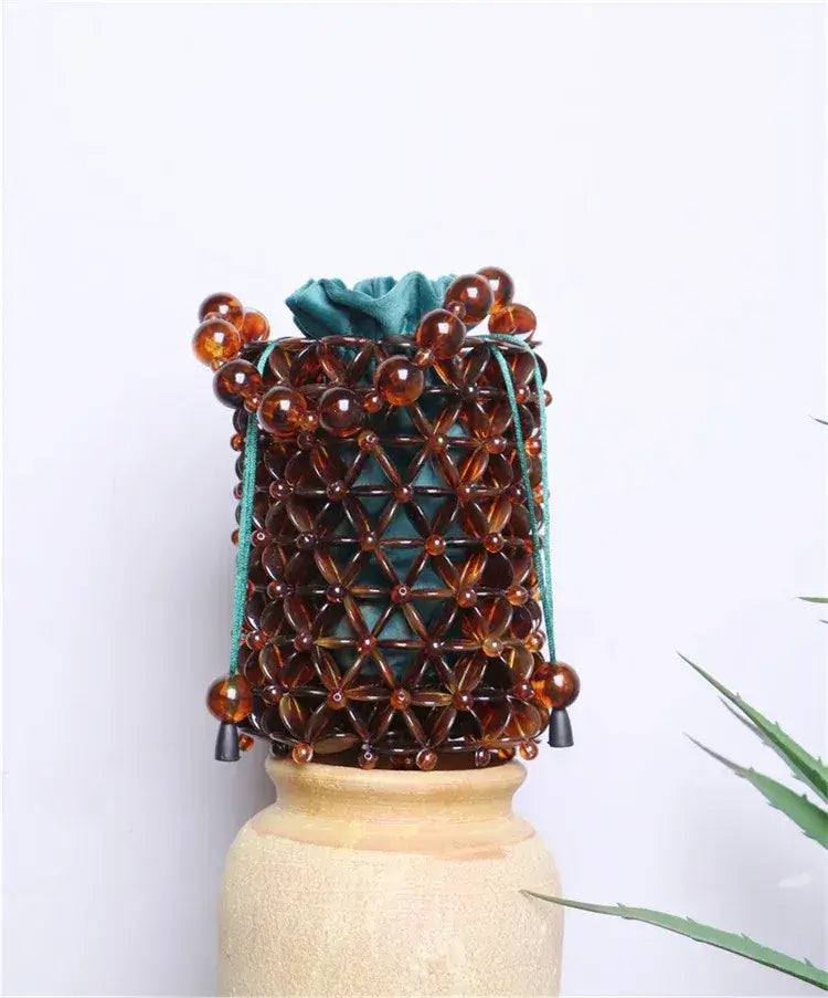 Bolsa Ambra de Mão