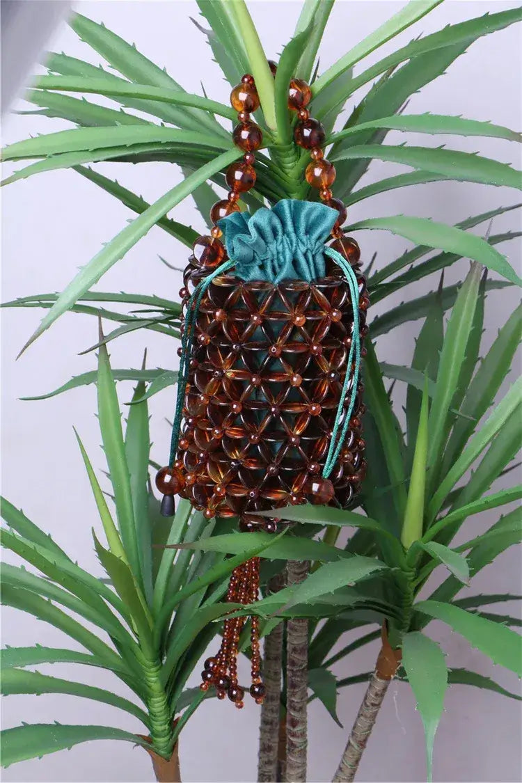 Bolsa Ambra de Mão