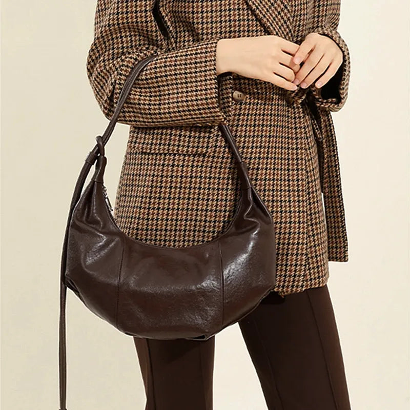 Bolsa Hobo em couro Bebel