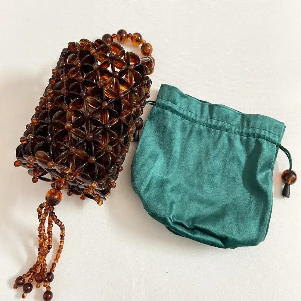Bolsa Ambra de Mão