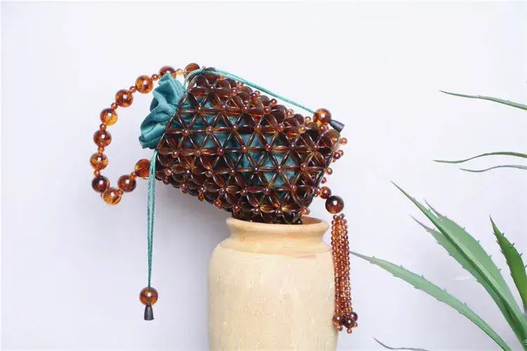Bolsa Ambra de Mão