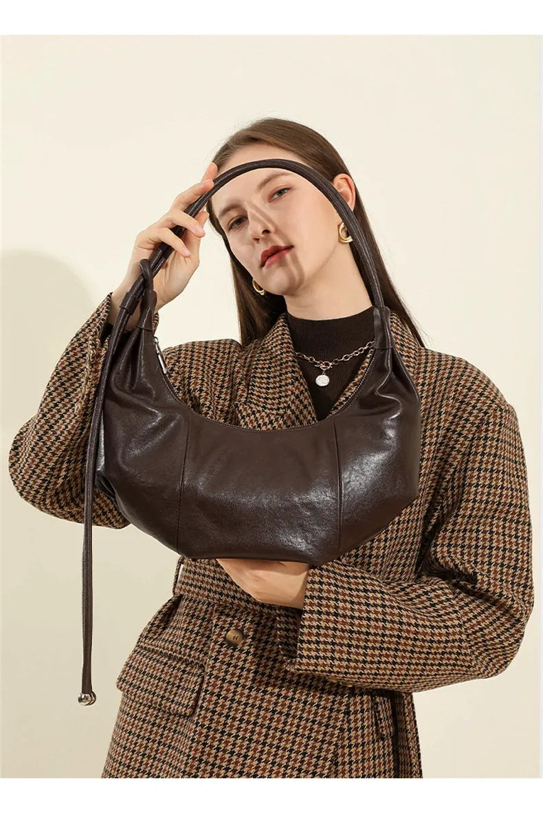 Bolsa Hobo em couro Bebel