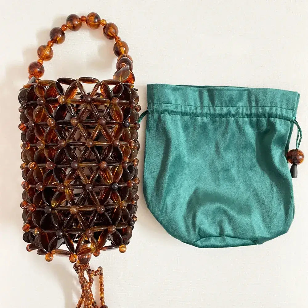 Bolsa Ambra de Mão
