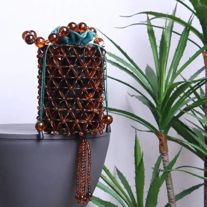 Bolsa Ambra de Mão