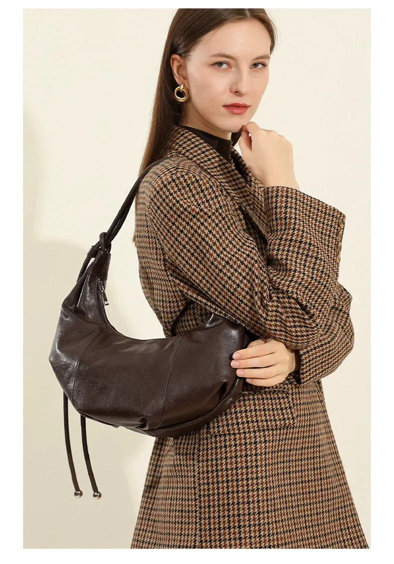 Bolsa Hobo em couro Bebel