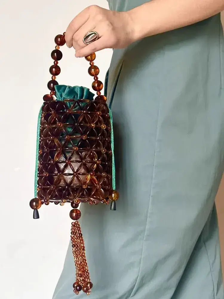 Bolsa Ambra de Mão
