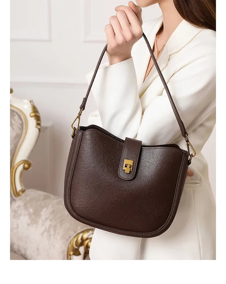 Bolsa de ombro feminina de couro natural