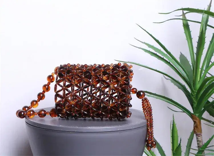 Bolsa Ambra de Mão